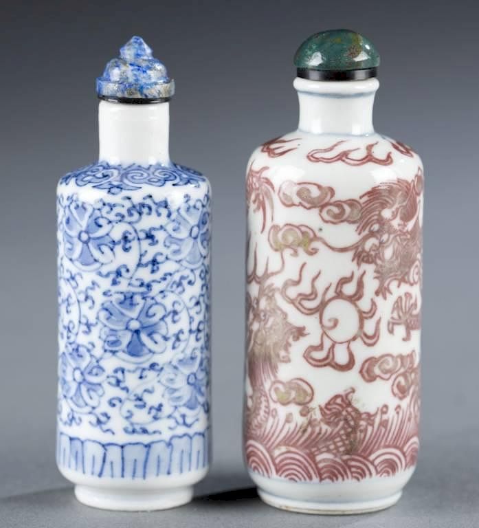 Appraisal: Two porcelain Chinese snuff bottles Two Chinese porcelain cylinder form