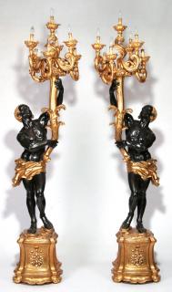 Appraisal: A PAIR LATE TH C PARCEL GILT VENETIAN BLACKAMOORS A