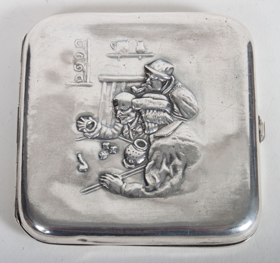 Appraisal: American sterling silver cigarette case with embossed image of men