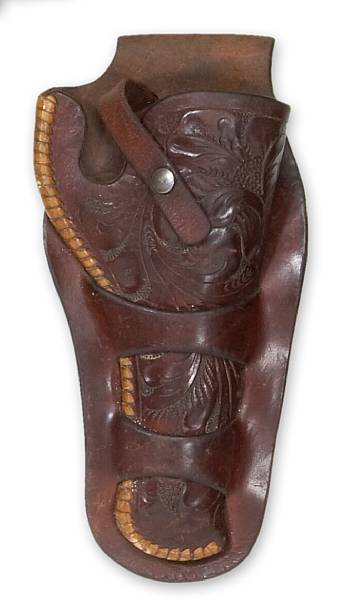 Appraisal: A tooled leather western holster by H H Heiser Buckstitched