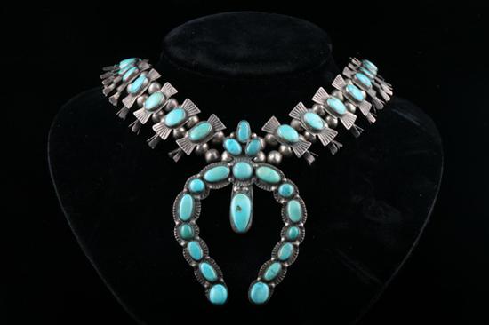 Appraisal: NAVAJO STERLING SILVER AND TURQUOISE SQUASH BLOSSOM NECKLACE Circa s