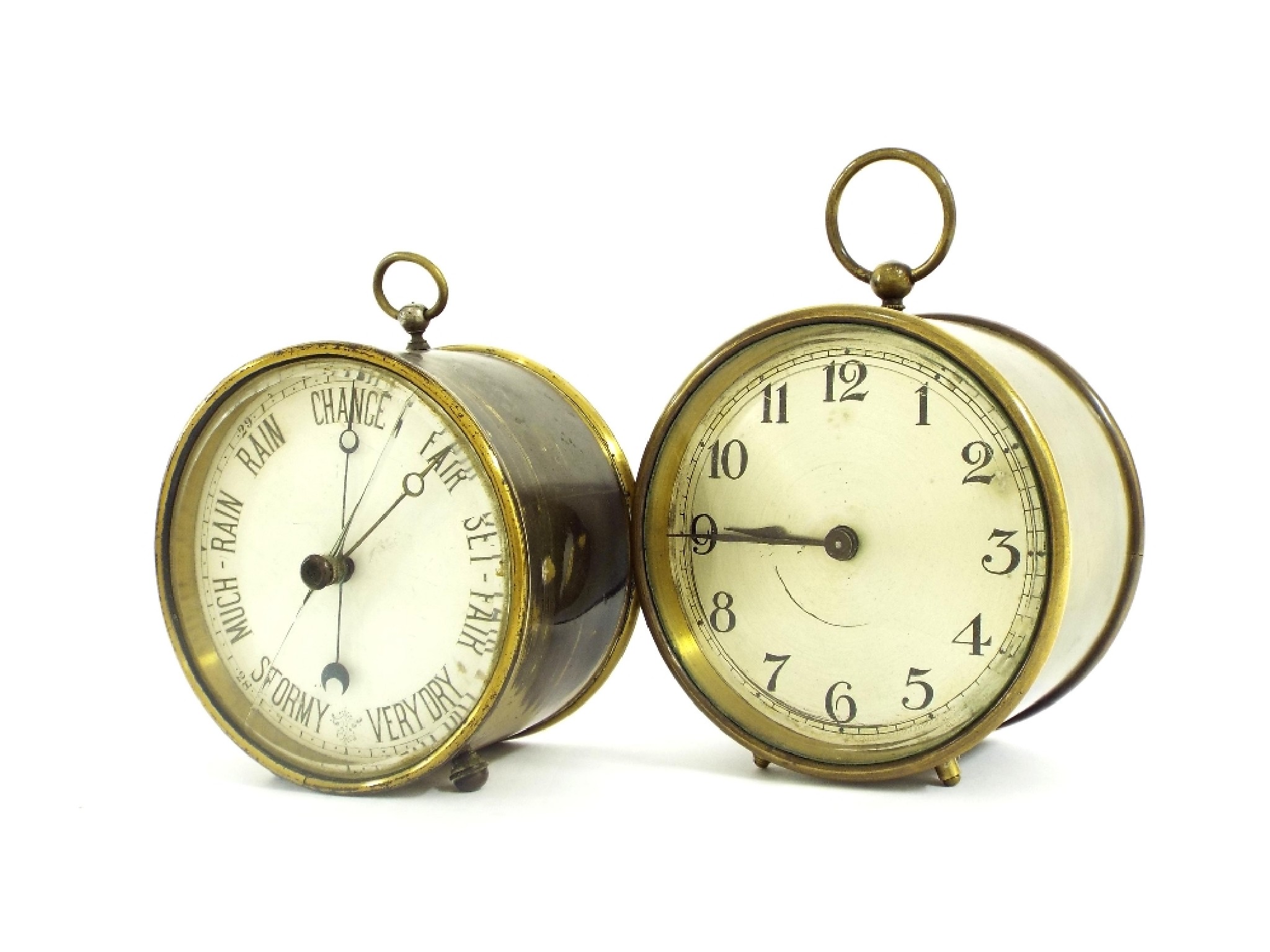 Appraisal: Brass drumhead clock timepiece high together with a brass aneroid