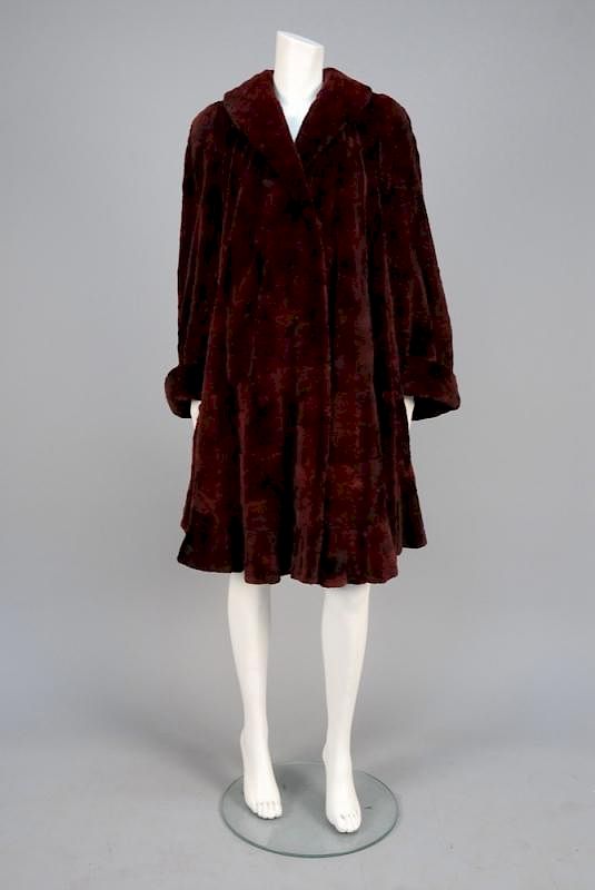 Appraisal: MAXIMILIAN DYED FUR SWING COAT with FLOUNCED HEM Claret sheared