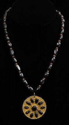 Appraisal: EARLY PERSIAN GRANULATED GOLD AND GARNET NECKLACE WITH PENDANT in