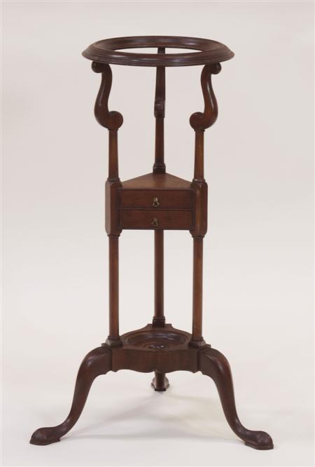 Appraisal: A matched pair of George III mahogany washstands each with