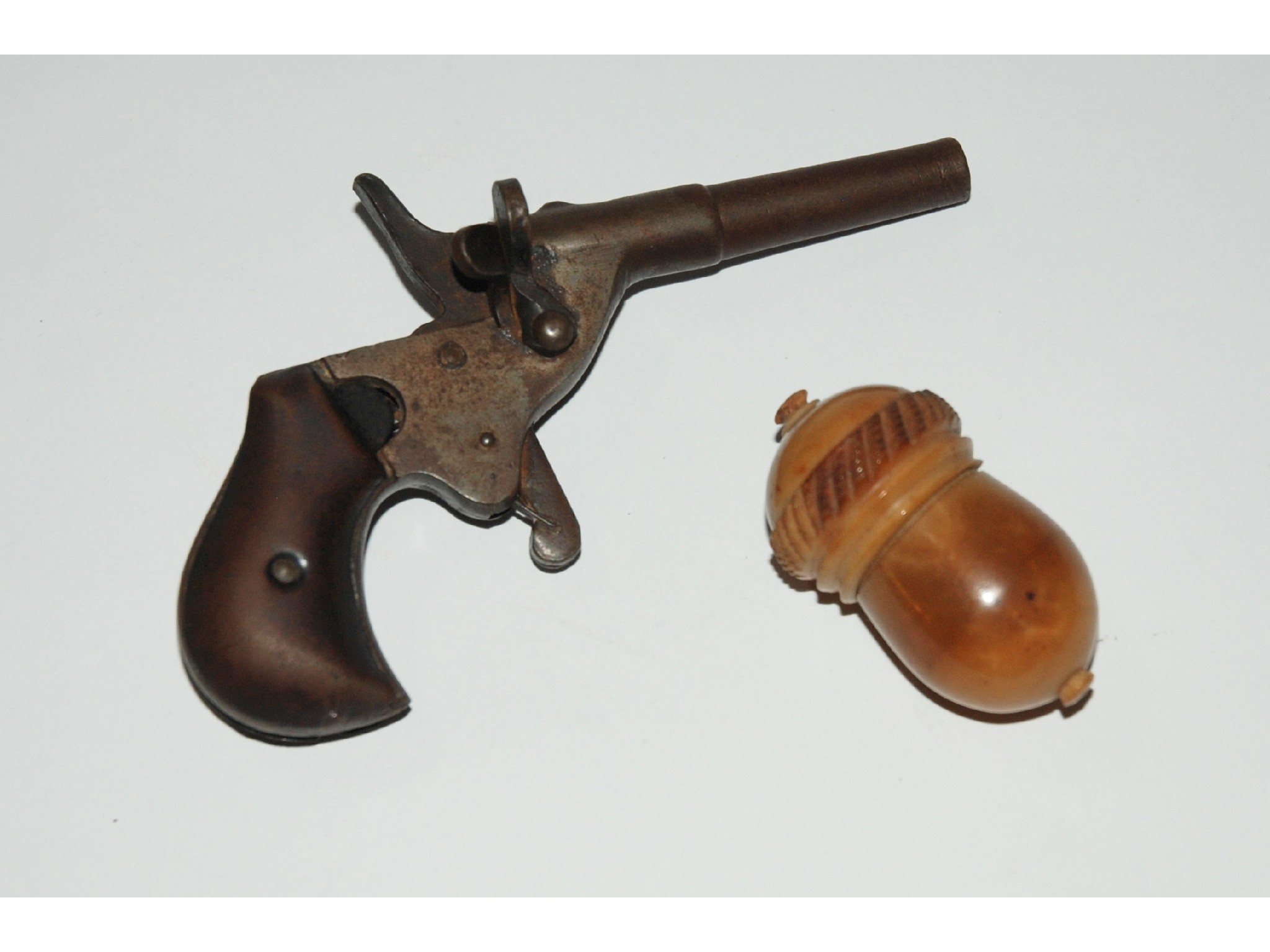 Appraisal: A collection of miscellaneous including dog scaring pistol acorn thimble