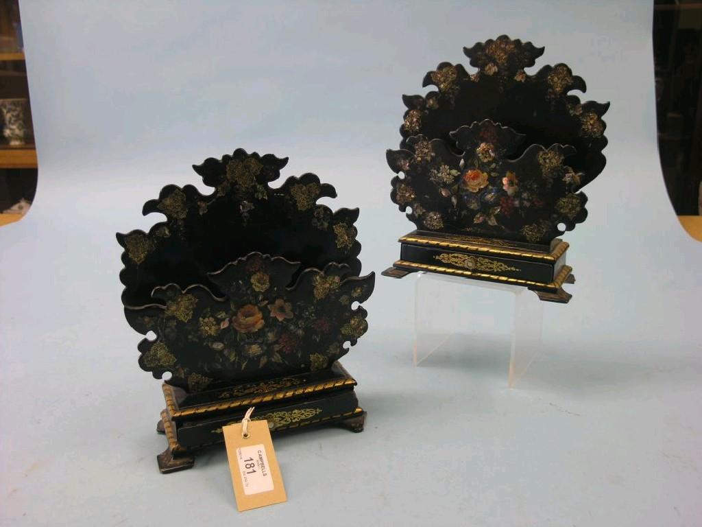 Appraisal: A pair of Victorian papier mache desk racks each with