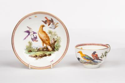 Appraisal: A Coalbrookdale documentary teacup and saucer painted birds within a