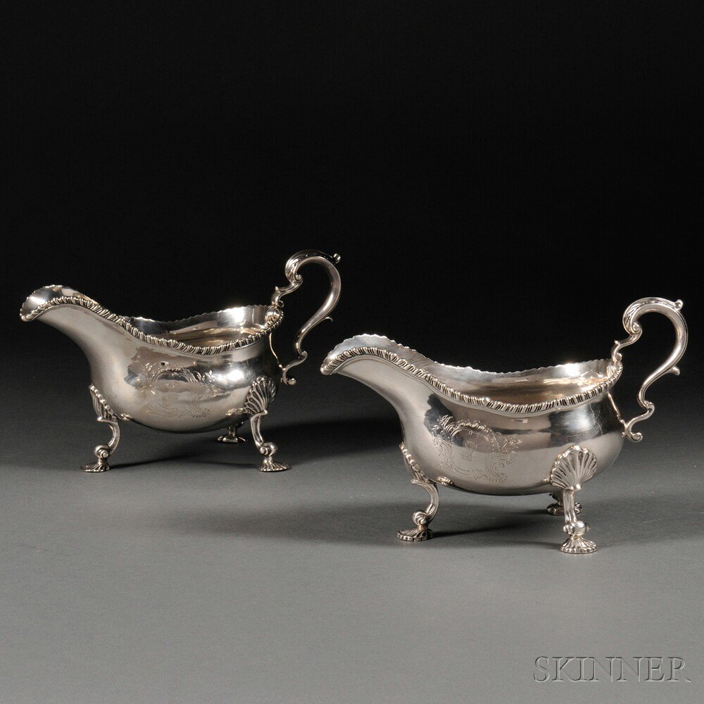 Appraisal: Two Georgian Sterling Silver Sauceboats London each with an engraved