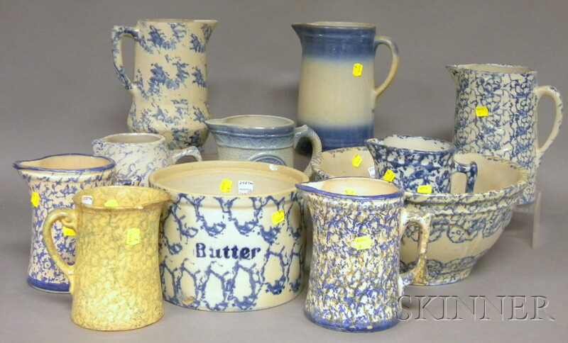 Appraisal: Seven Blue and White Spongeware Pitchers a Butter Crock and