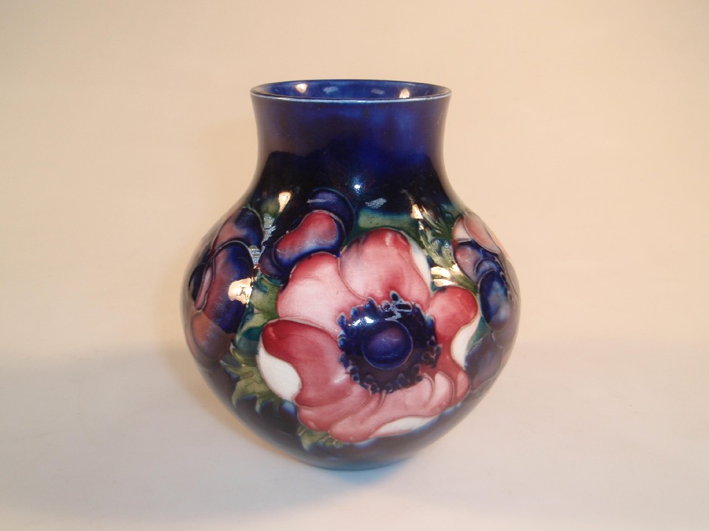 Appraisal: A Moorcroft pottery baluster vase tube lined and painted with