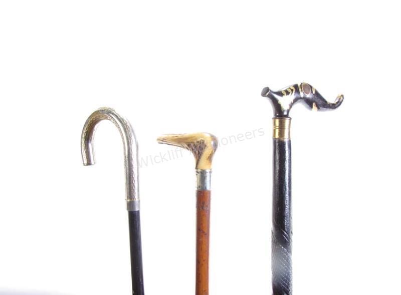 Appraisal: Group of Three Dress Canes including solid wood shaft with