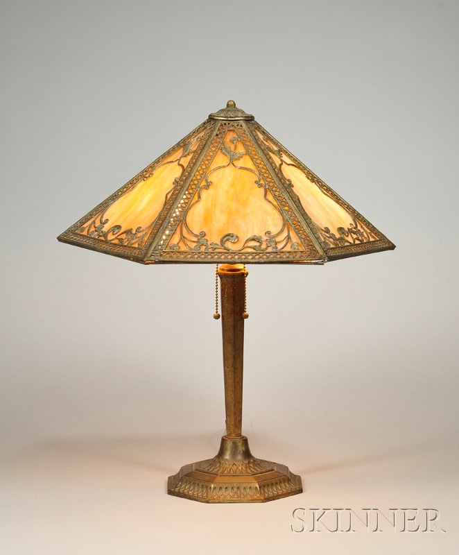 Appraisal: Metal Overlay Table Lamp Patinated metal and slag glass United