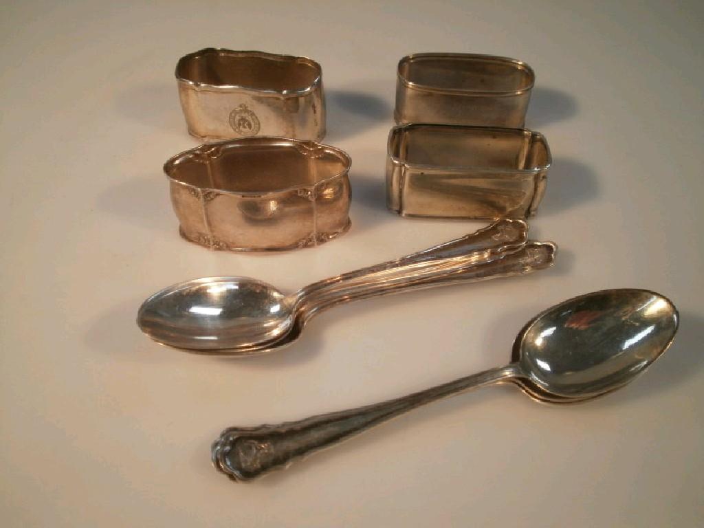 Appraisal: Four continental silver napkin rings and six similar spoons