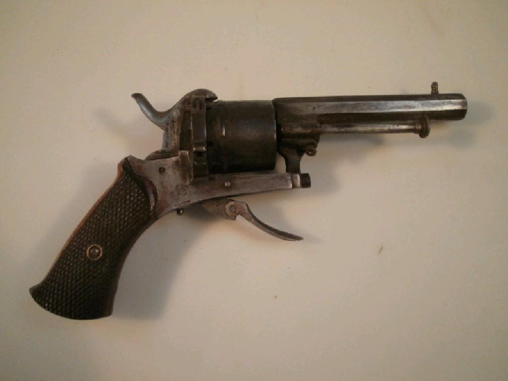 Appraisal: A thC six shot single action revolver with side loading