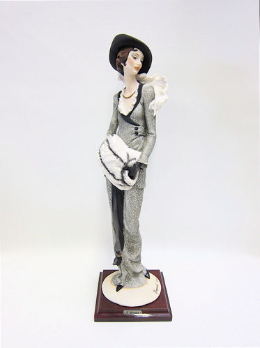 Appraisal: GUISEPPI ARMANI FIGURAL SCULTURE Lady With Muff limited edition -C