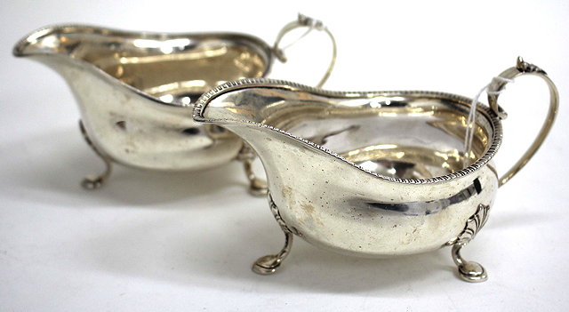 Appraisal: A PAIR OF ELKINGTON CO SILVER SAUCE BOATS with beaded