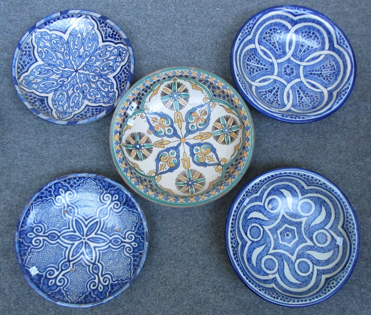 Appraisal: Five North African pottery bowls early th century decorated with