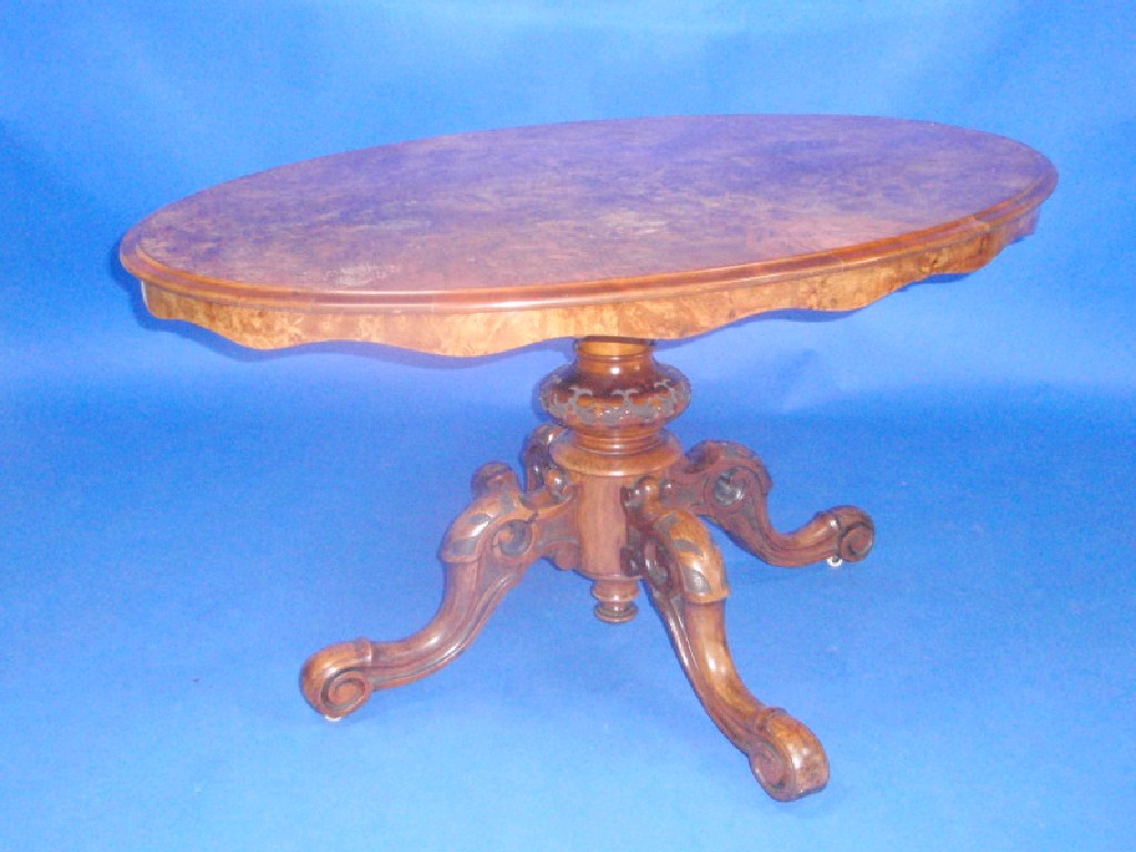 Appraisal: A Victorian burr walnut loo table with quarter veneered oval