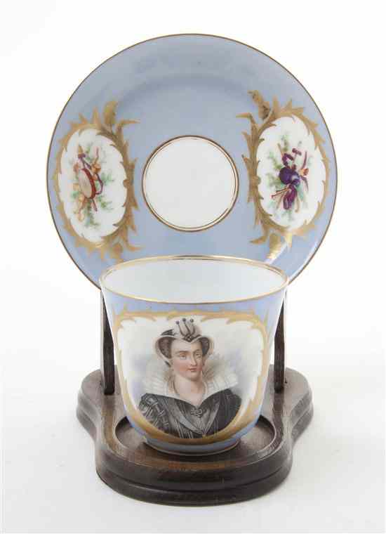 Appraisal: A Sevres Style Porcelain Cup and Saucer the cup decorated