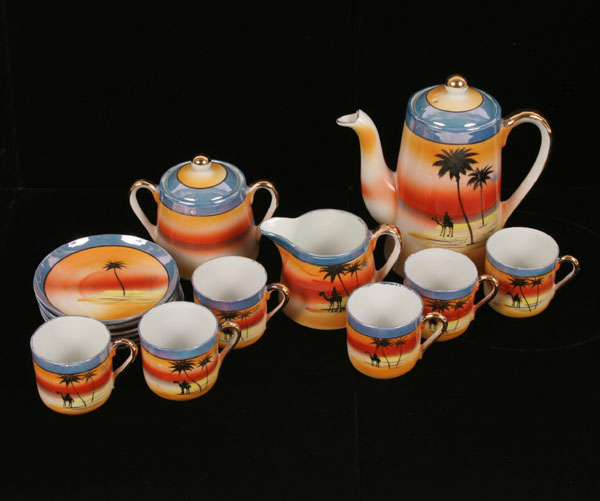 Appraisal: Japan Lustreware piece tea set with gilt handles and finials