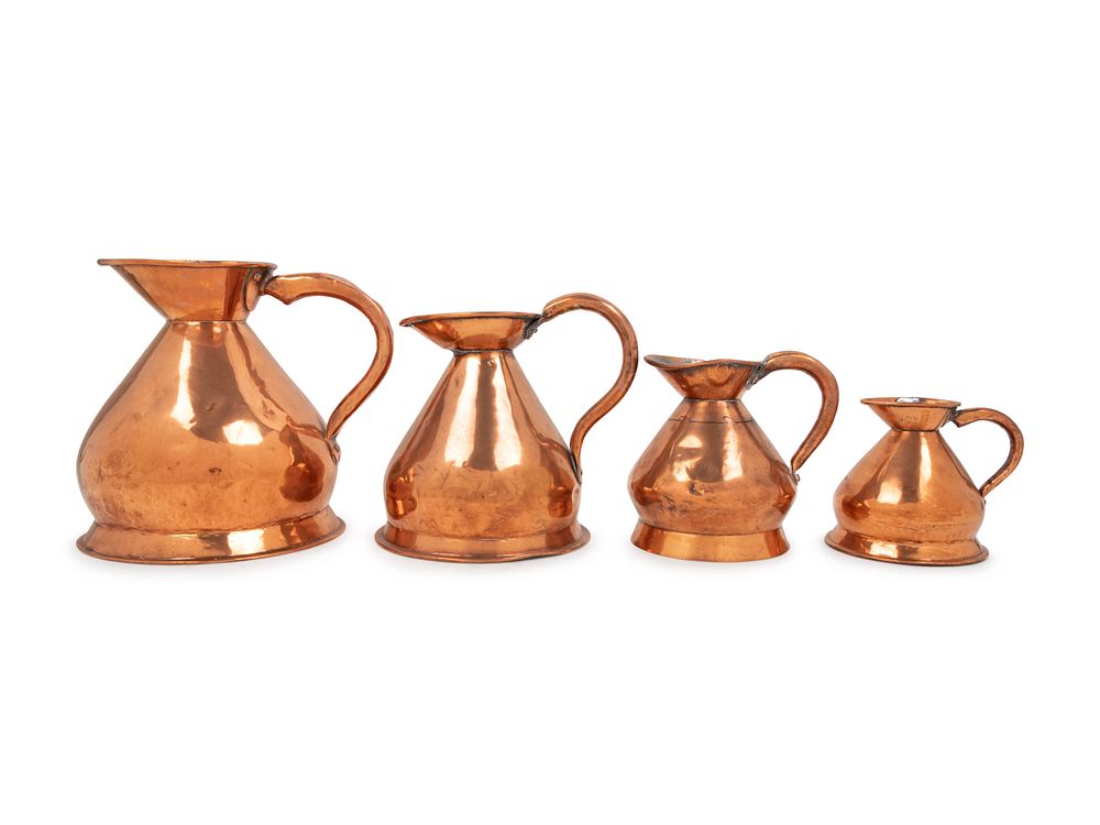 Appraisal: A Set of Four English Copper Measures A Set of