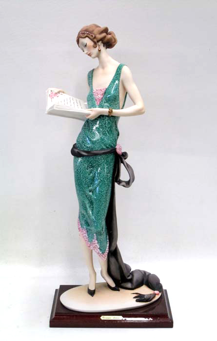 Appraisal: FLORENCE PORCELAIN FIGURINE BY GIUSEPPE ARMANI titled Lady With Book