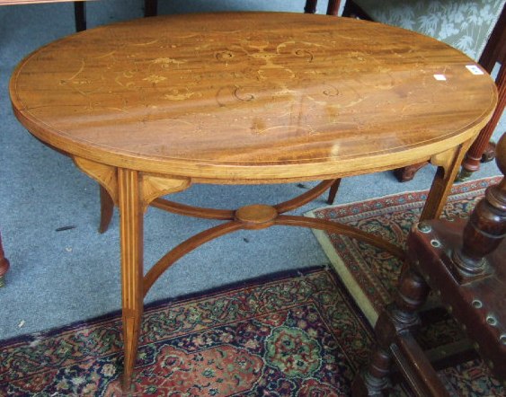 Appraisal: An Edwardian oak mahogany and classical marquetry occasional table cm