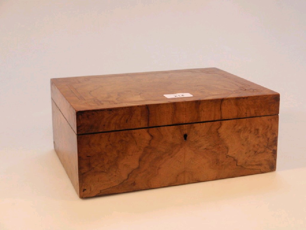 Appraisal: A Victorian rectangular figured walnut work box with cross banded