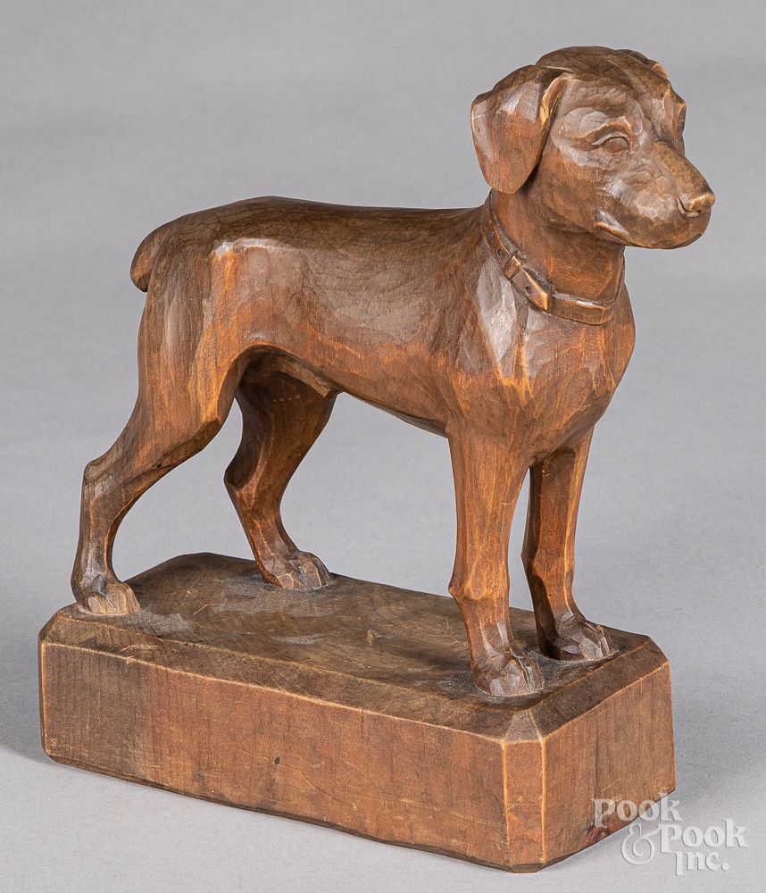 Appraisal: Woodenware to include a carved dog Woodenware to include a