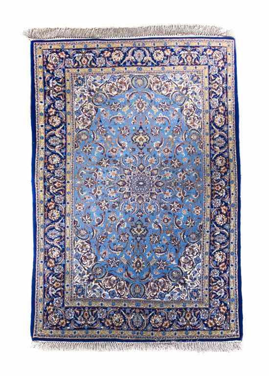 Appraisal: An Isfahan Wool Rug having a center medallion surrounded by