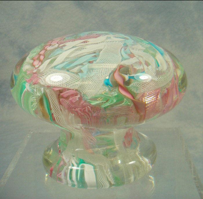 Appraisal: Mushroom paperweight with latticework ribbon interior in white pink blue