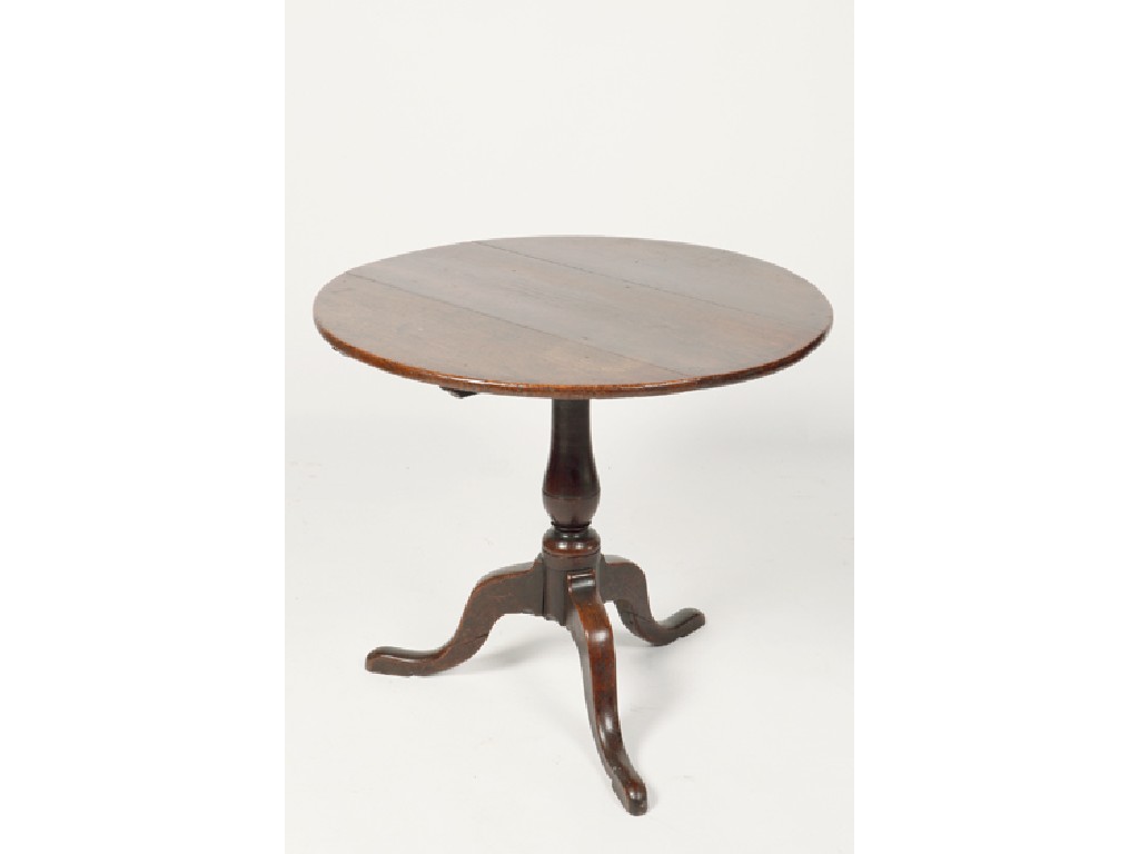 Appraisal: A GEORGE III OAK TRIPOD TABLE the circular tip top