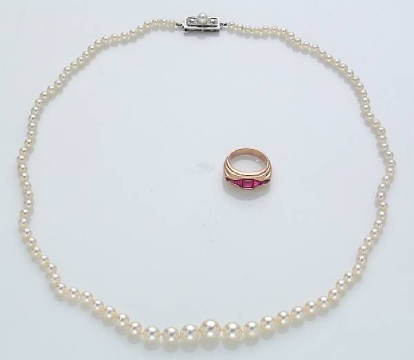 Appraisal: A graduated cultured pearl diamond and k white gold necklace