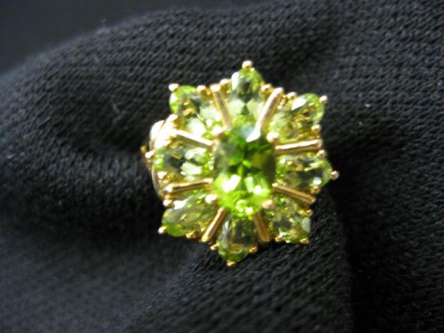 Appraisal: Peridot Ring rich oval gems in k yellow gold