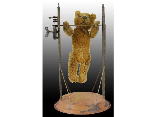 Appraisal: German Teddy Bear Swing Toy Description Wind-up Not working Mohair