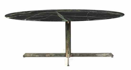 Appraisal: A Contemporary Marble and Chromed Dining Table the oval top