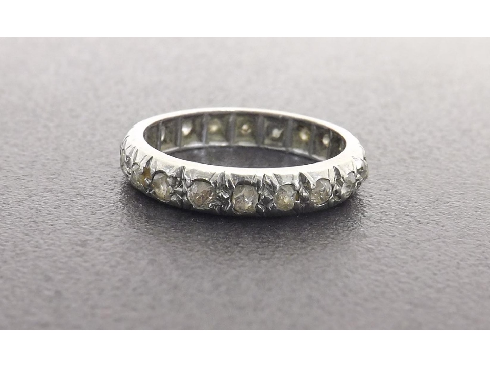 Appraisal: Full old-cut diamond eternity ring in white metal probably platinum