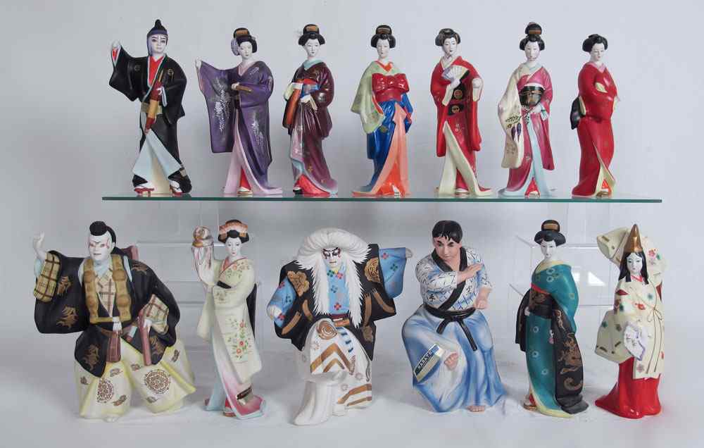 Appraisal: COLLECTION OF FIGURAL SAKE DECANTERS figures from the House of