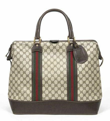 Appraisal: Vintage Gucci travel bag in GG Supreme coated canvas with