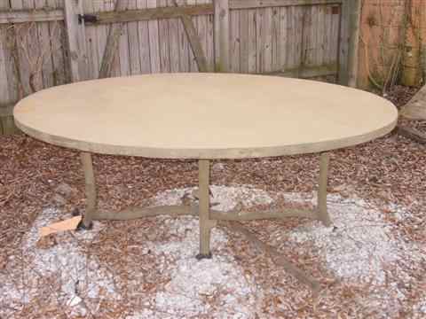 Appraisal: COLVIN AND HASTINGS LARGE OVAL DINING TABLE Of cast stone