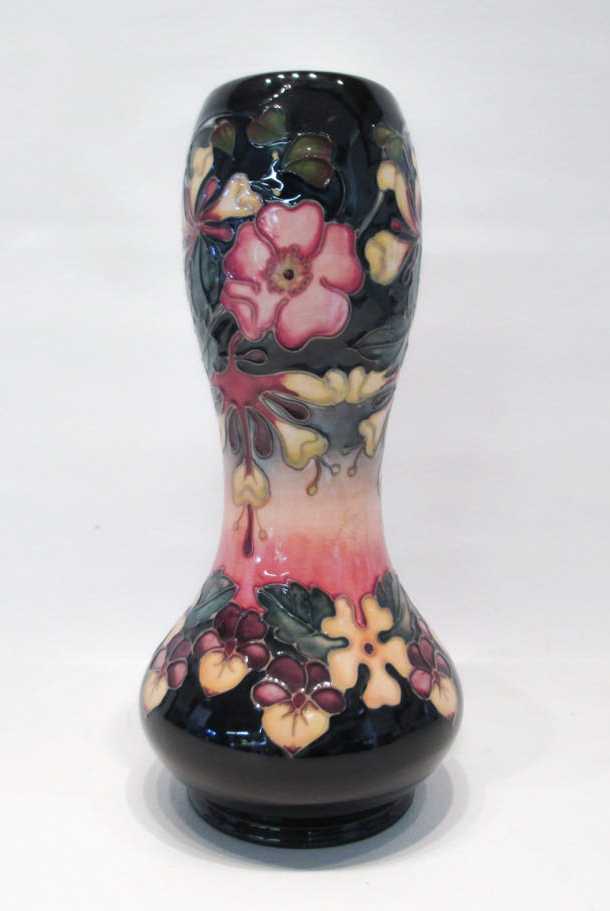 Appraisal: MOORCROFT POTTERY VASE having a cobalt ground in the Oberon