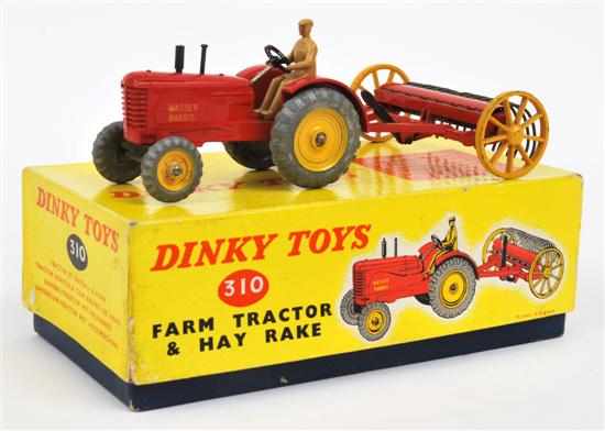 Appraisal: Dinky Farm Tractor And Hay Rake Massey Harris Tractor red