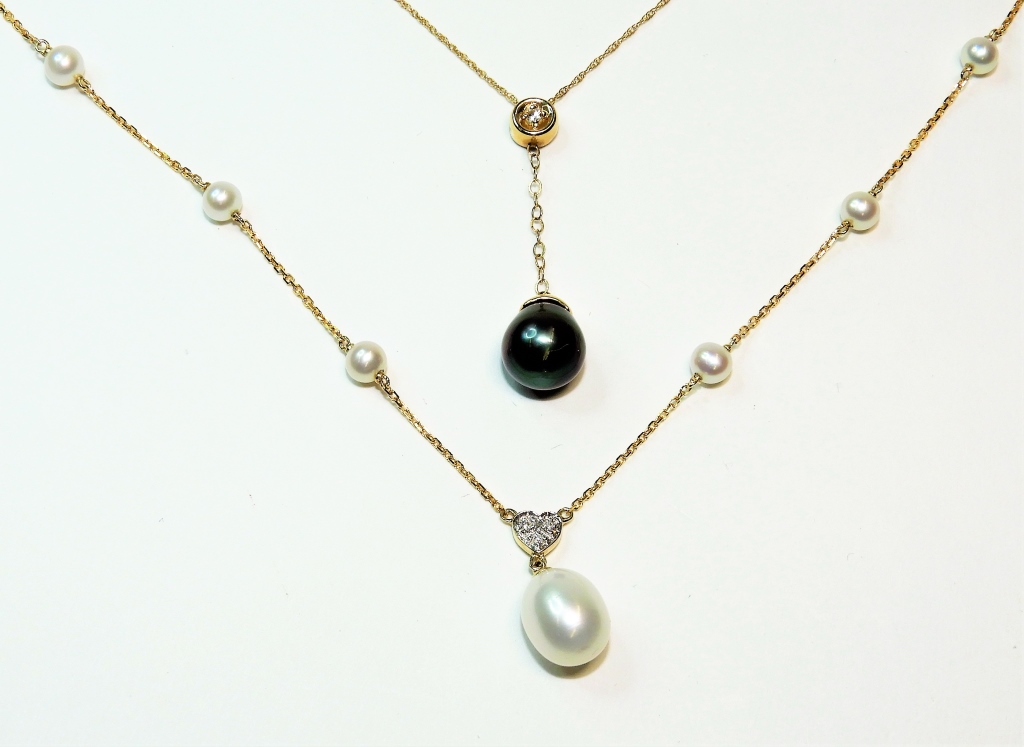 Appraisal: PC K YELLOW GOLD SILVERY WHITE PEARL NECKLACES China th