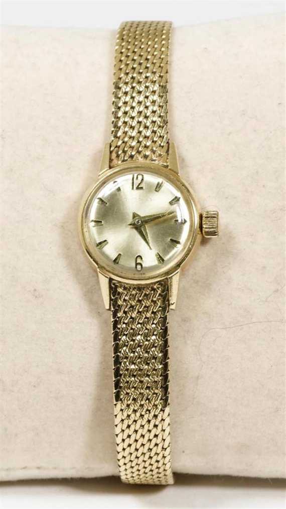 Appraisal: LADY'S WRISTWATCH ca Yellow gold g Small round case with