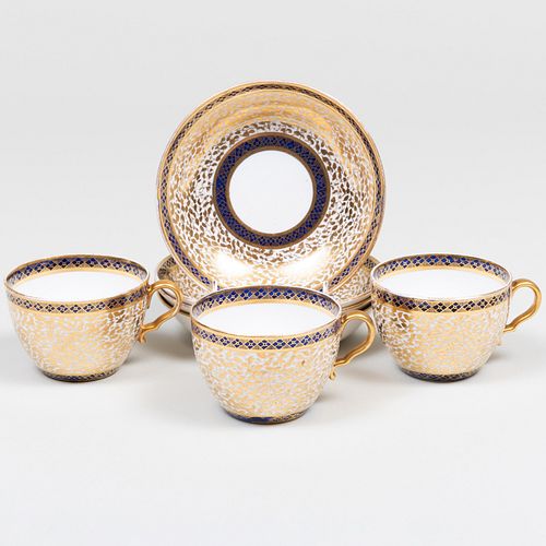 Appraisal: SET OF THREE SPODE GILT-DECORATED PORCELAIN TEACUPS AND FOUR SAUCERSSome