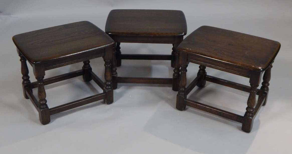 Appraisal: Three stained oak Ercol occasional tables each with a rectangular