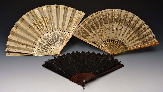 Appraisal: A SPANISH FAN with pierced bone sticks and satin with