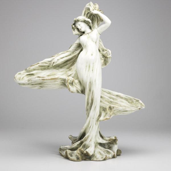 Appraisal: RIESSNER STELLMACHER KESSELLarge Amphora porcelain figurine of lady dancing with