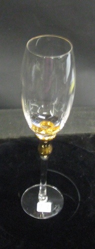 Appraisal: A SET OF CLEAR FLUTED WINE GOBLETS having gold accents